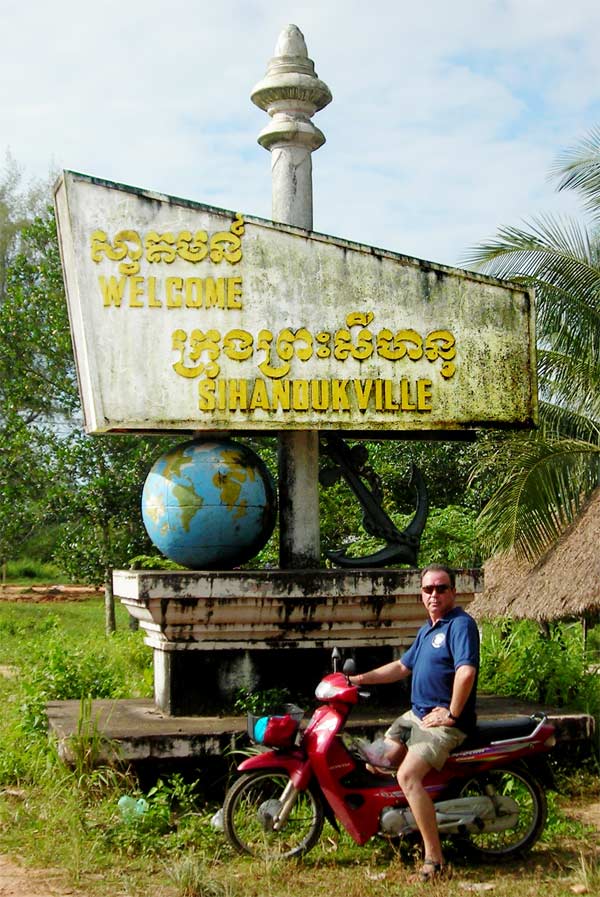 mick and welcome to sihanoukville sign