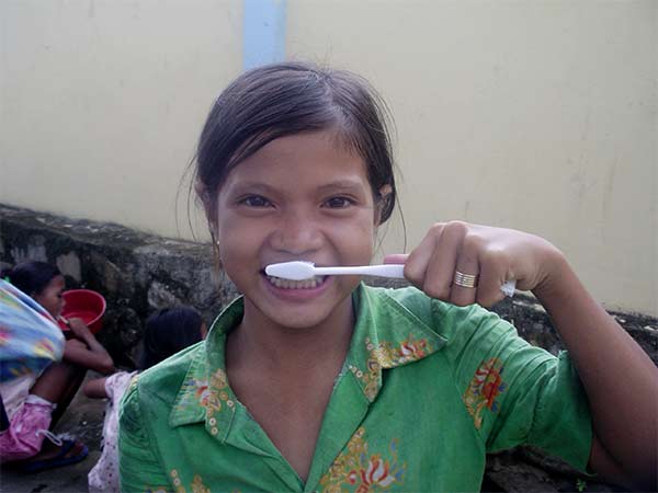 learning to brush teeth at the goodwill school in sihanoukville, cambodia
